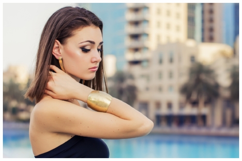 Woman Wearing a 14k Gold Bangle