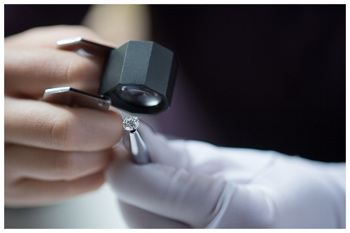 Jeweler Inspecting a Handcrafted Engagement Ring with a Loupe