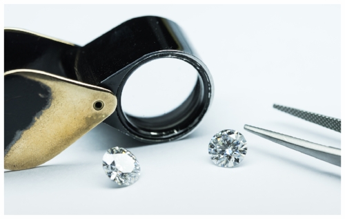 Jewelry Loupe with 1 Carat Diamonds Used to Determine the Gem's Authenticity