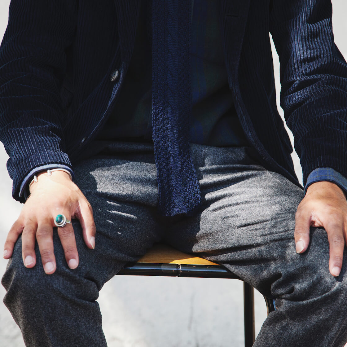 engineered garments pants, engineered garments cable knit tie, homecore jacket, and corridor shirt on body