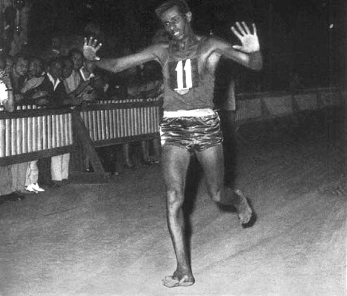 abebe bikila running barefoot in the 1956 olympics