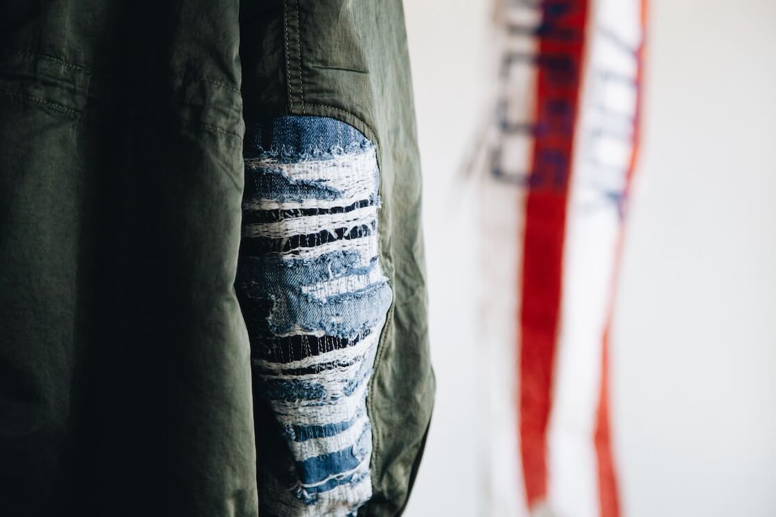 visvim indigo camping trading post find your happiness six five fishtail parka on body