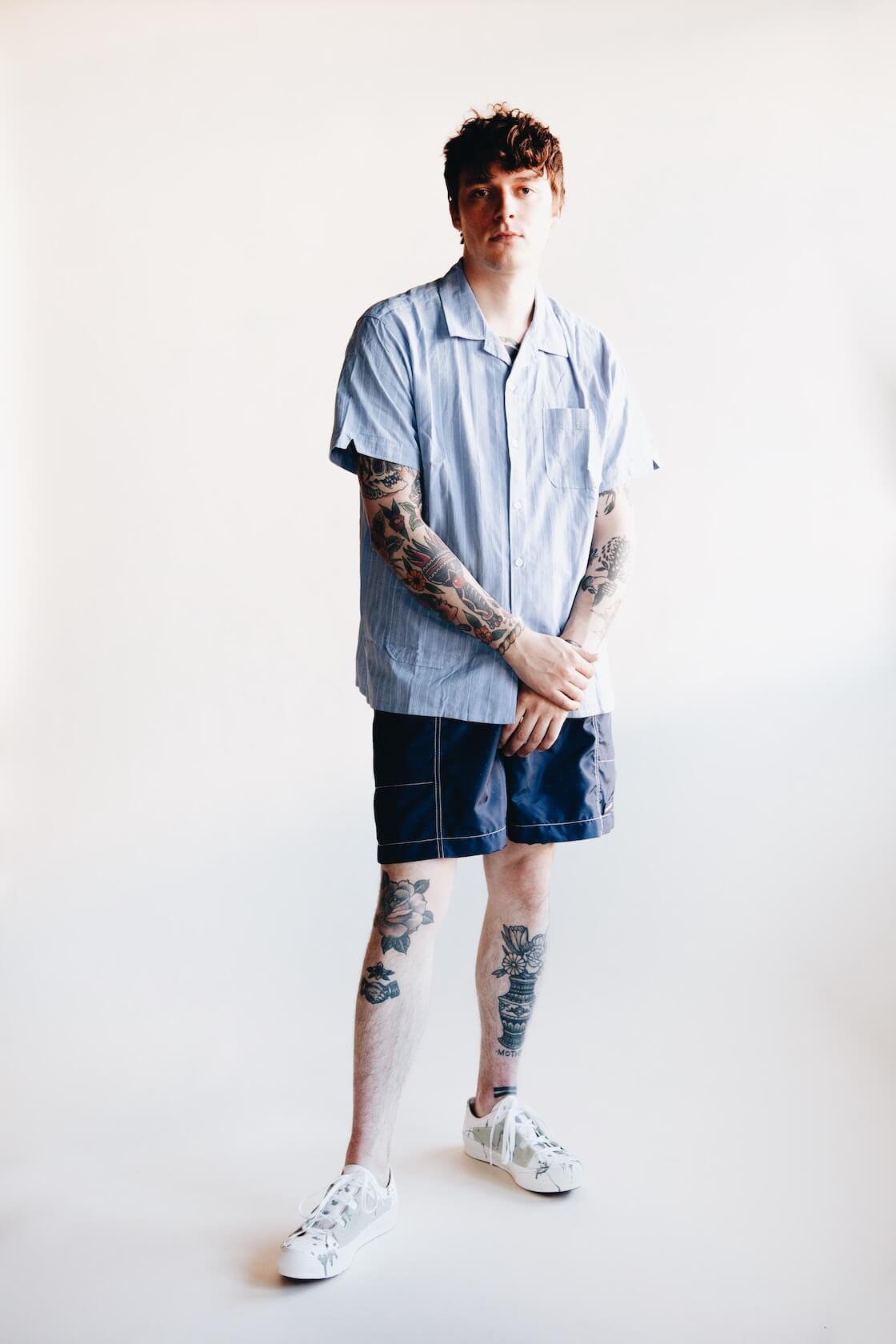 engineered garments camp shirt, nanamica deck shorts, and needles asymmetric ghillie sneakers on body