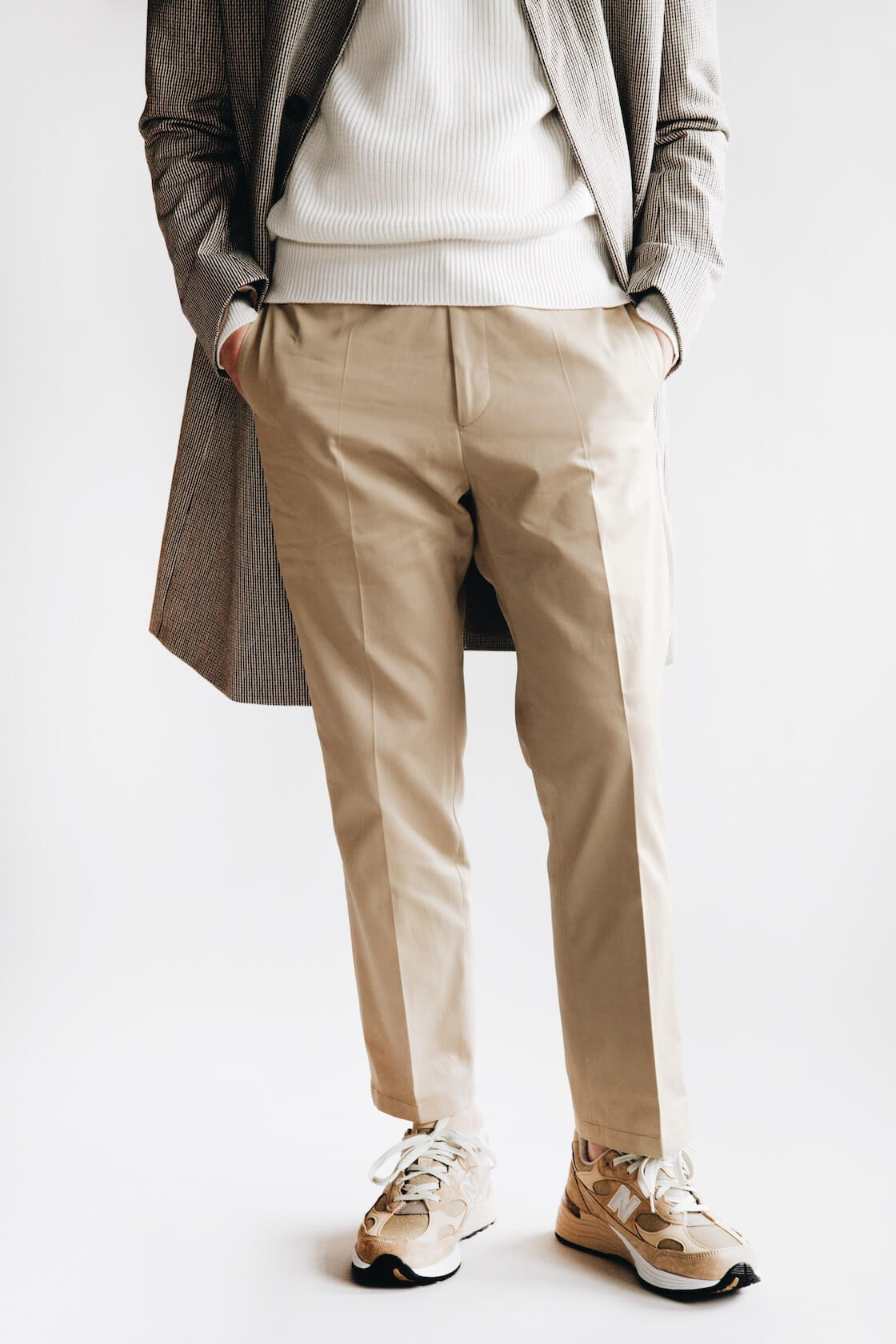 harmony paris maximus coat, wade sweater, patrizio trousers and new balance shoes on body