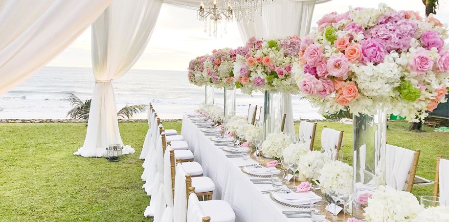 Outdoor spring/summer wedding reception featuring white, pink, green chiffon and polyester linens