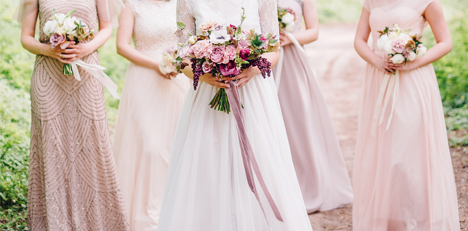 Dusty rose/mauve bridal party with sage and emerald green bouquets