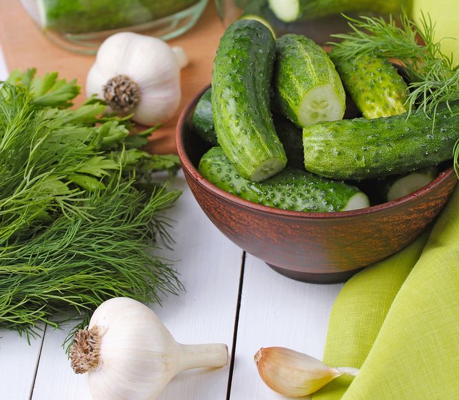 Dill pickle ingredients on kitchen counter