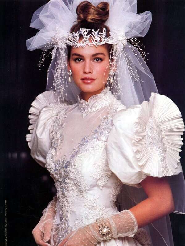 bride wearing elaborate veil from the 1980s