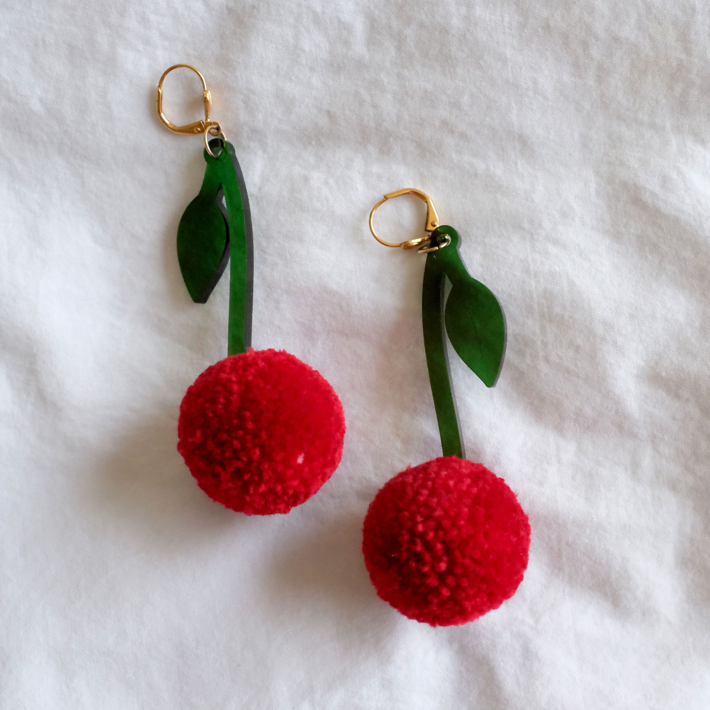 Make pom pom cherry earrings with this easy - Jenny Lemons