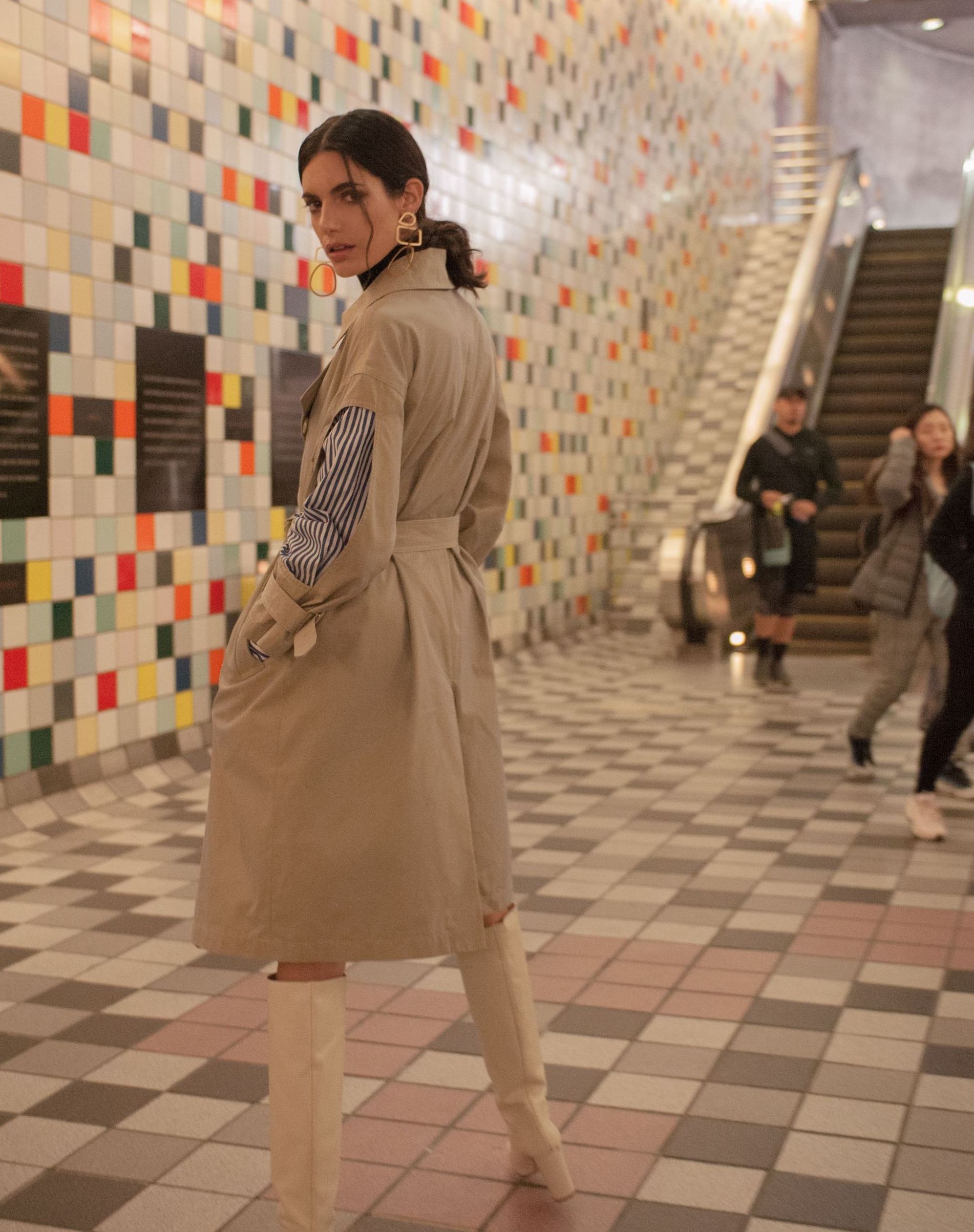 Model wearing the Hildy Trench Coat by J.ING women's clothing