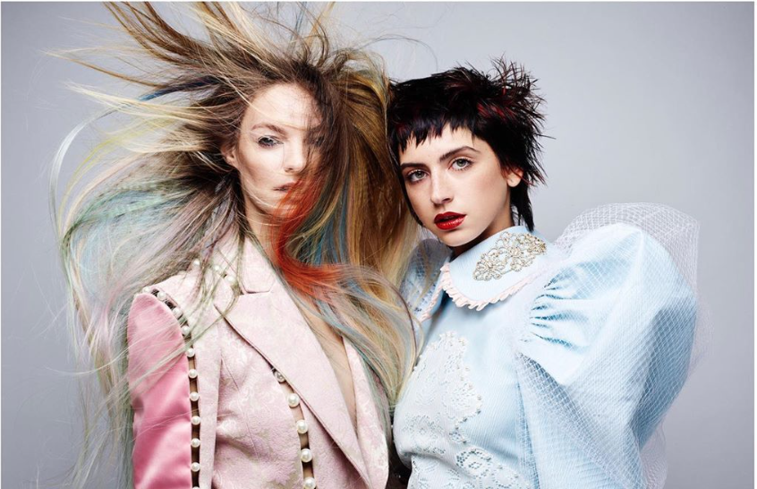 Two women with colourful hair posing for a magazine - Josh Wood Hair Colour Expert