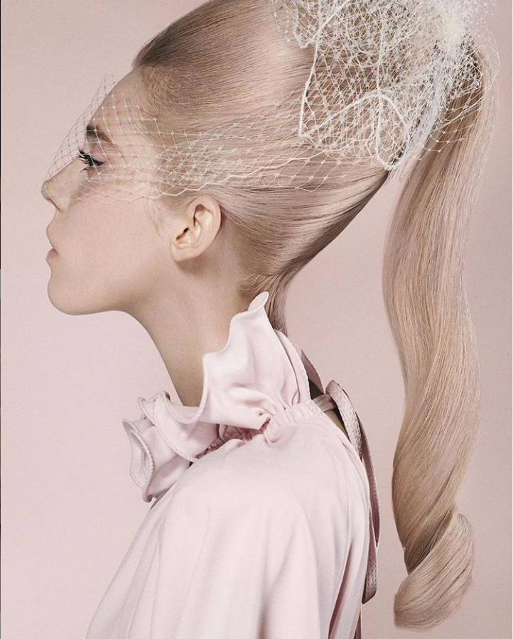 A blonde woman with a veil in her hair - Josh Wood Hair Colour Expert