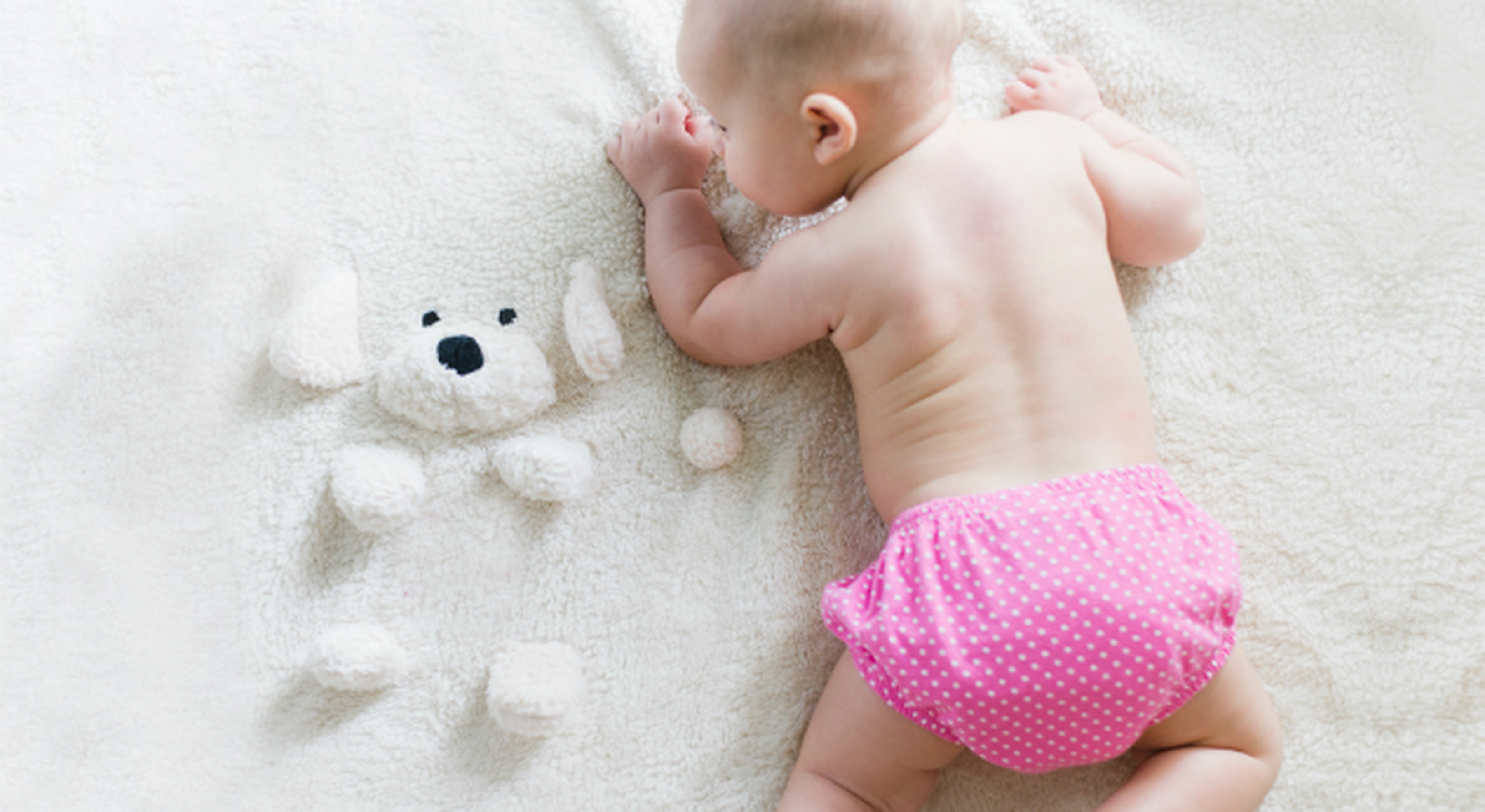 Baby in disposable diaper
