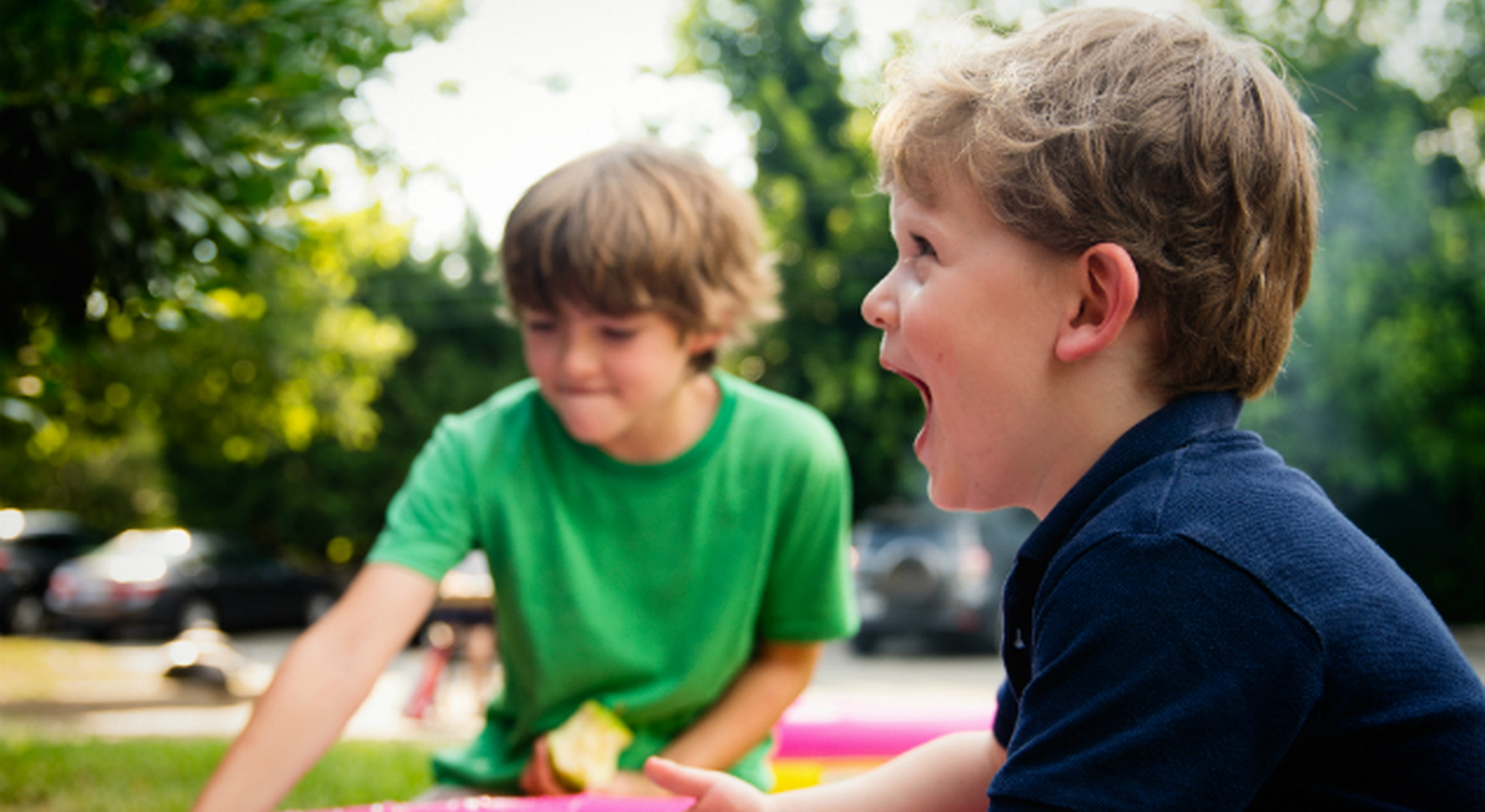 Two young boys playing together