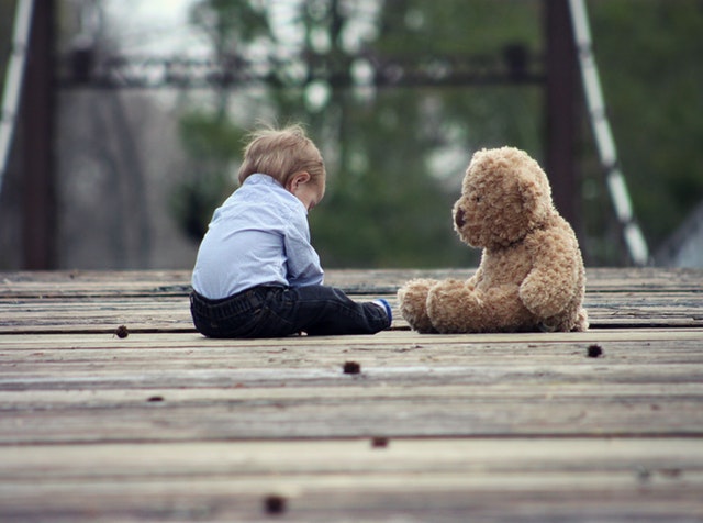 Boy with teddy bear