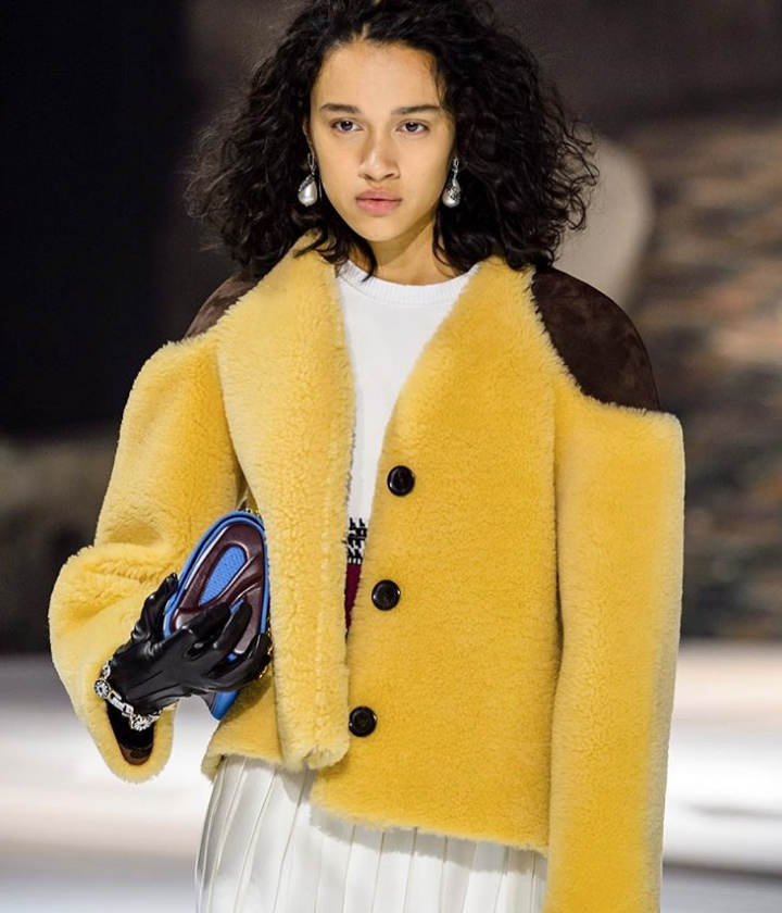 yellow Louis Vutton cropped fur coat with brown shoulder pads