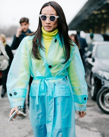elizabeth von der goltz wearing a light blue transparent calvin klein jacket coat