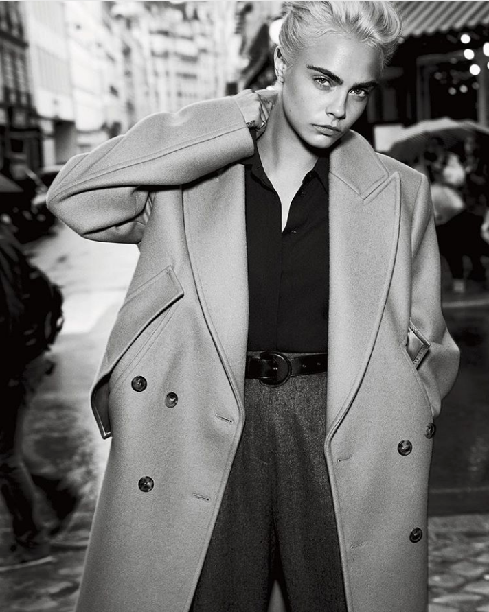 cara delevingne wearing a michael kohrs jacket coat