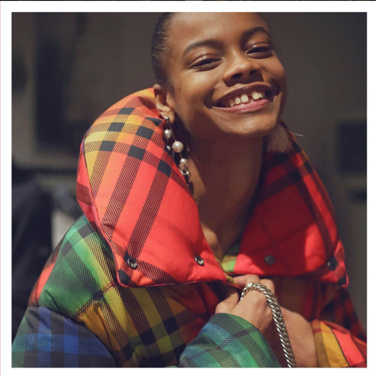 aaliyah hydes wearing a multi coloured burberry puffer coat