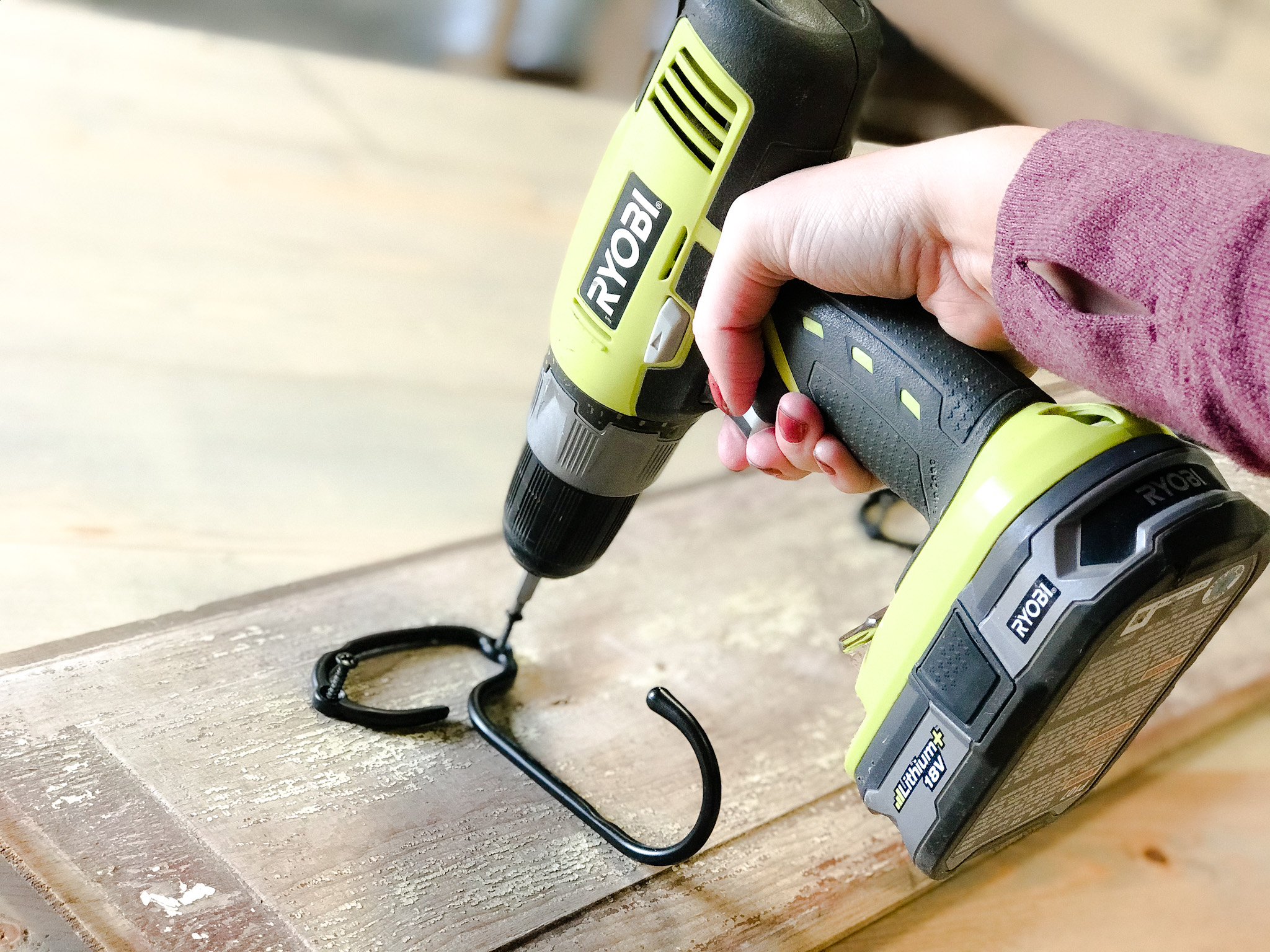 using a drill to attach a hook